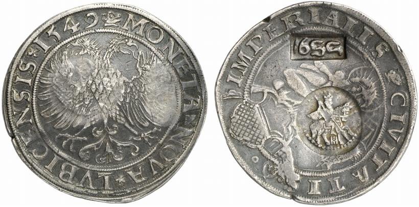 талер  1542  года дата на левом фото надчеканка на правом фото.jpg